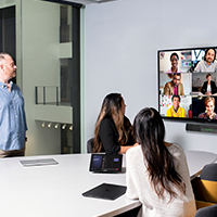 People in conference room on a video call