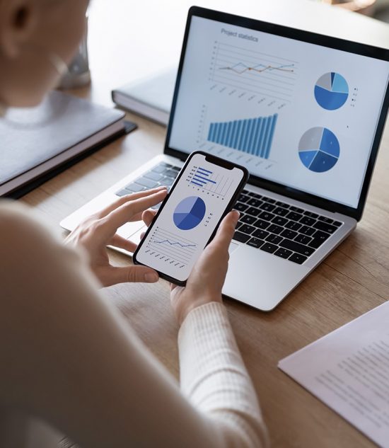 Viewing reporting on smartphone and laptop